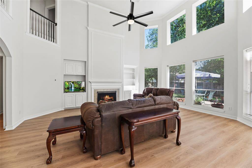 Several windows in the family room display an amazing view of the spectacular backyard!