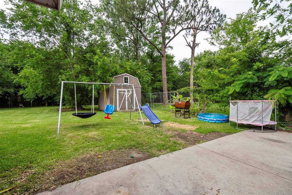The shed is great for storing yard tools.