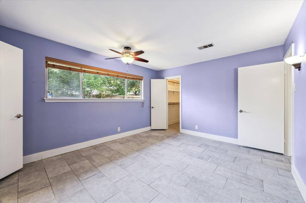 Quiet, rear-facing primary bedroom suite.