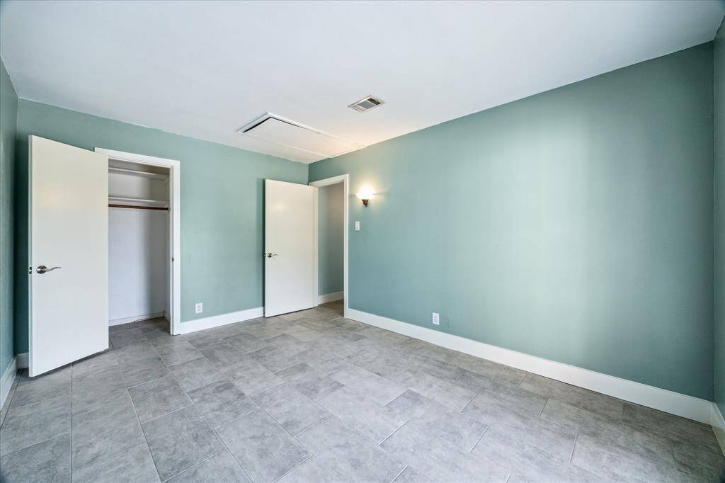 Oversized secondary corner bedroom.