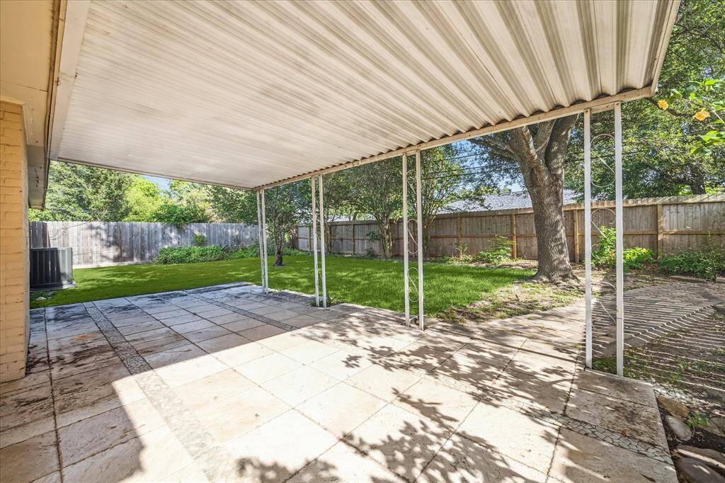 Relax, grill, or dine al fresco on the the quiet covered patio in your back yard retreat.