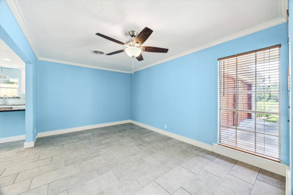 Oversized flexible dining room or sitting room up front.