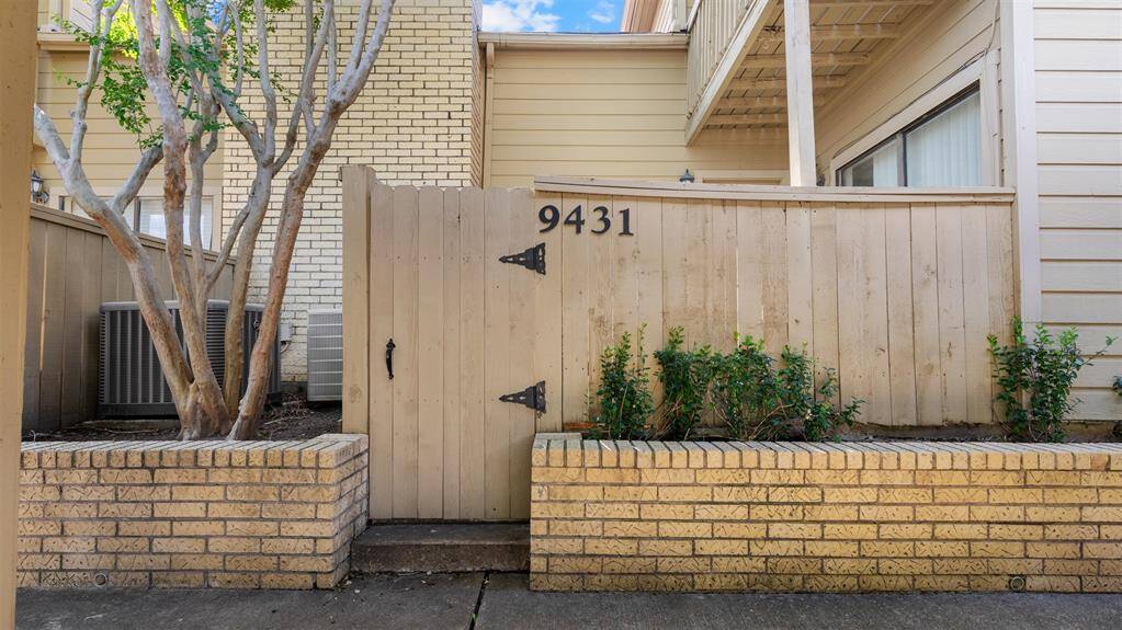 Front gate to main entrance of home