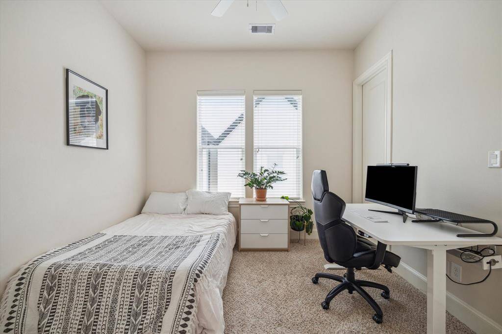 Full size second bedroom located on the 3rd Floor with natural light, hardwoods and a full size private bathroom.