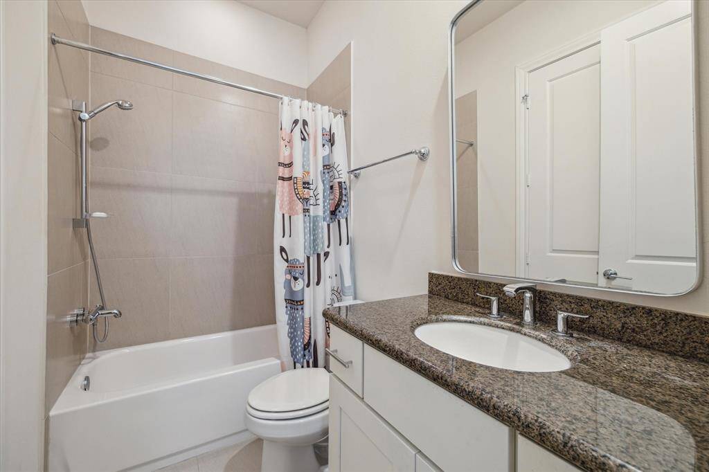 En Suite bathroom features a tub.