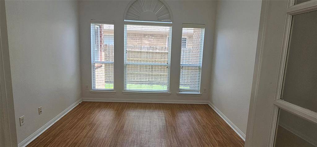 The double french doors leads you into the home office. Great space for the remote workers