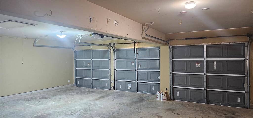 3-car garage with one garage door opener