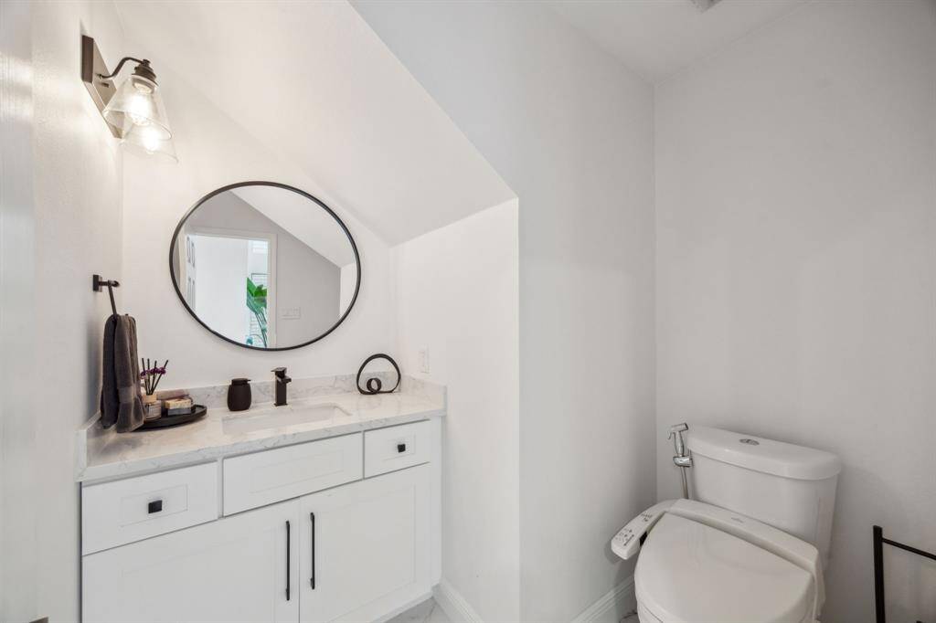 Convenient powder bath situated between the living and dining.