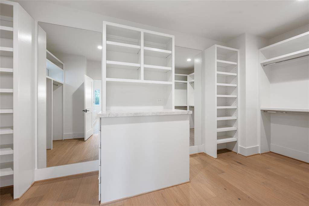 Another angle showing the second mirror in the primary closet