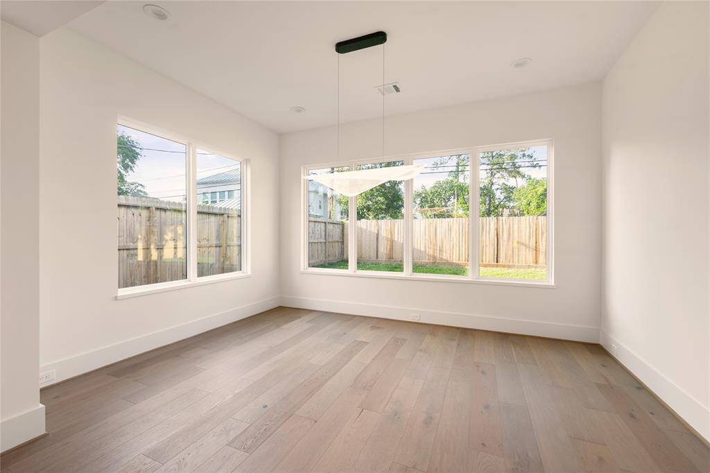 The separate dining room overlooks the spacious backyard.
