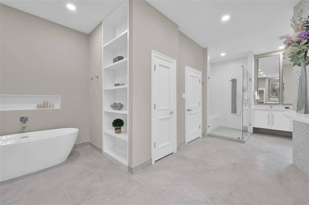 Bathroom has handy Washer/Dryer nook.