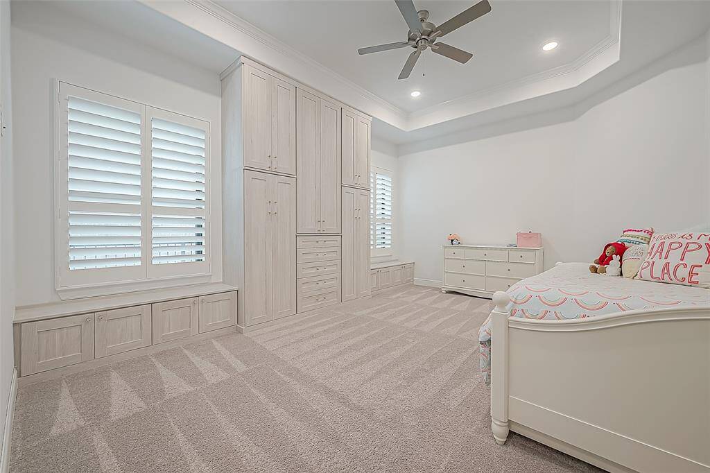 Charming double window seats offer cozy nooks for relaxation and storage.