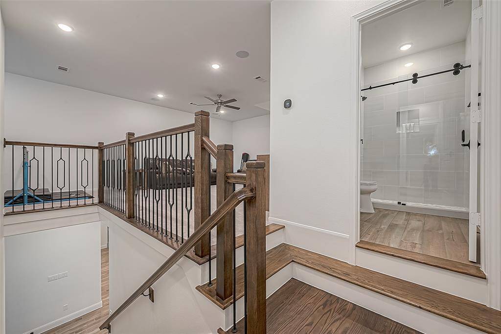 This convenient full bath serves both the game room and the upstairs guest bedroom.