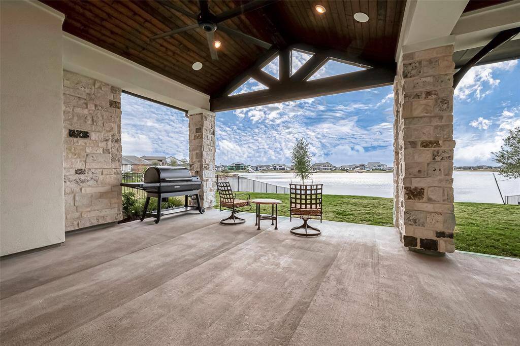 Enjoy breathtaking sunsets from your patio in the backyard during what the homeowner appropriately calls the GOLDEN HOUR.