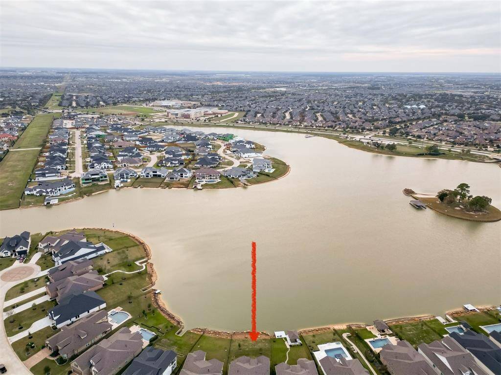 Enjoy direct water access from your backyard for kayaking and paddleboarding to the nearby island!