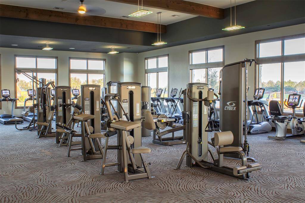 Enjoy a state-of-the-art gym with stunning lake views, exclusive to Towne Lake residents.