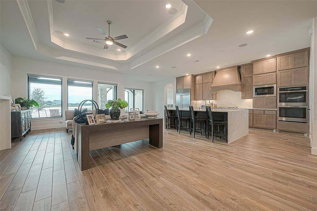 Beautiful flooring compliments the design and style of this custom home.
