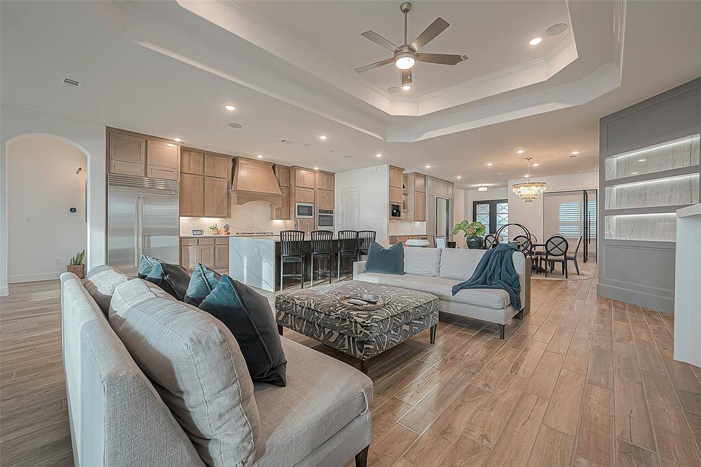 Experience seamless entertaining in this spacious, open-concept living area, perfect for staying connected while enjoying family time or entertaining.
