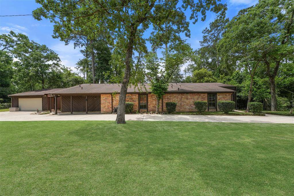 This home is ONE OF A KIND! Located right on Little Lake, it is the largest home in the neighborhood, on one of the largest lots, and wraps around the Lake.