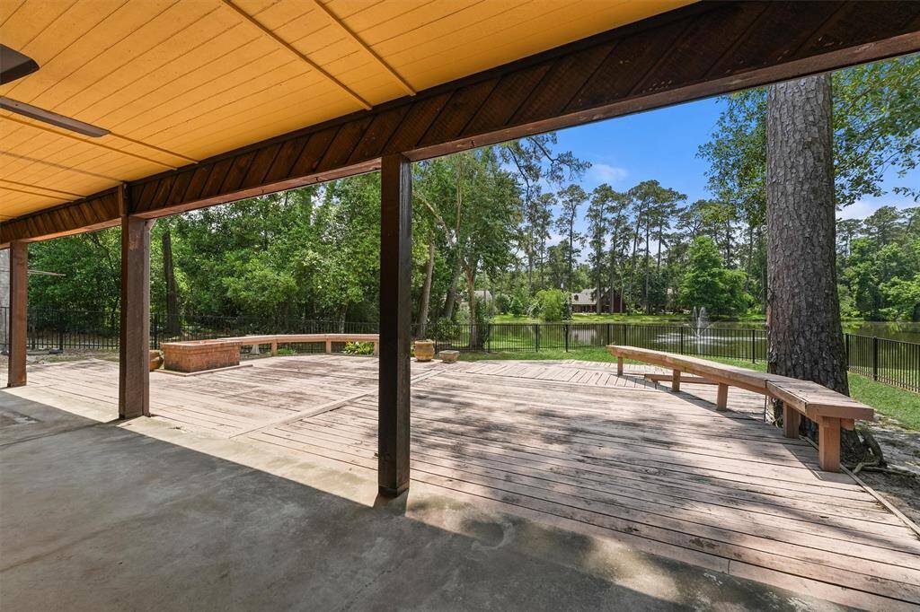 The patio runs along the full length of the house, every bedroom and the Family Room have doors leading out to the patio. A large deck offers a great space for entertaining, with views of Little Lake and the fountain. The Lake is private to residents and offers fishing and allows small boats!