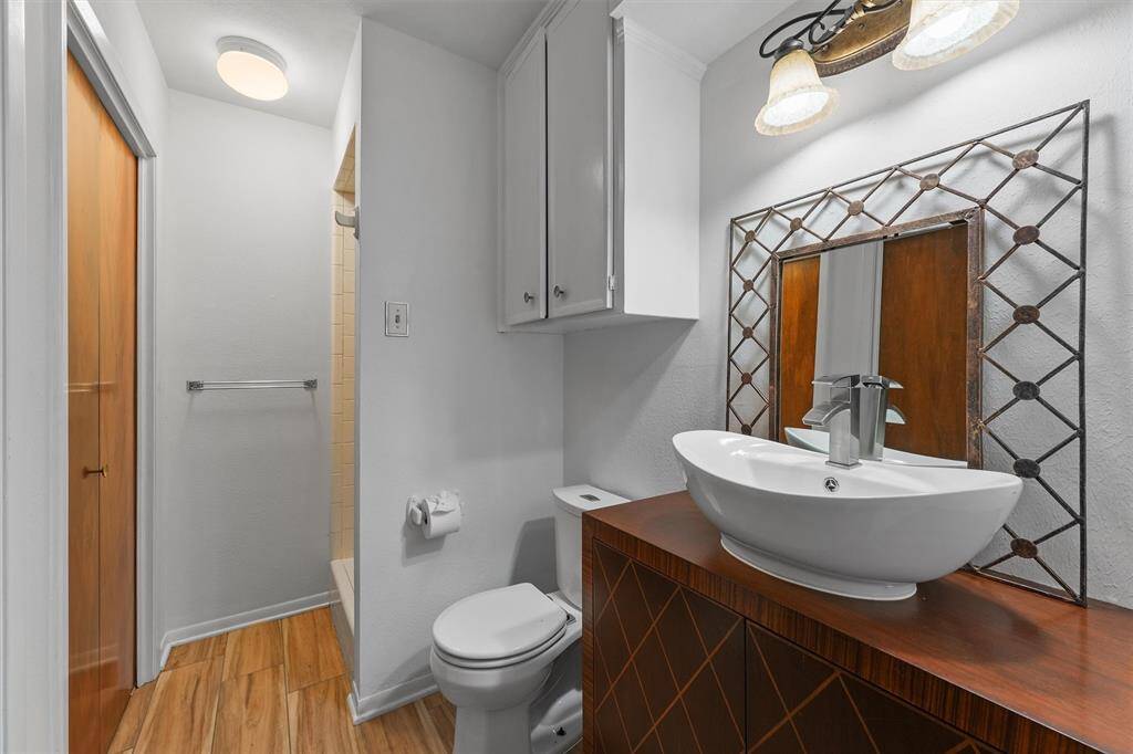 The Guest Quarters bathroom with updated plumbing and a walk-in shower.