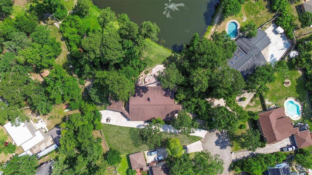 All of that open green space can be yours, with tons of room for expanding on the lot with a pool or play space.