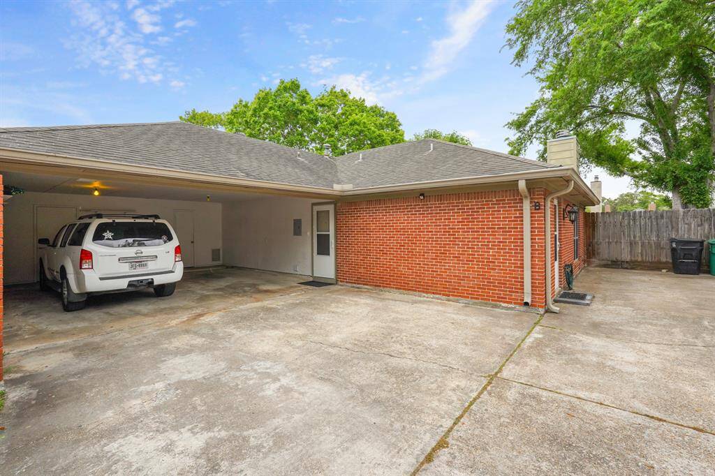 There is plenty of parking space plus easily access your carport that fits 2 cars