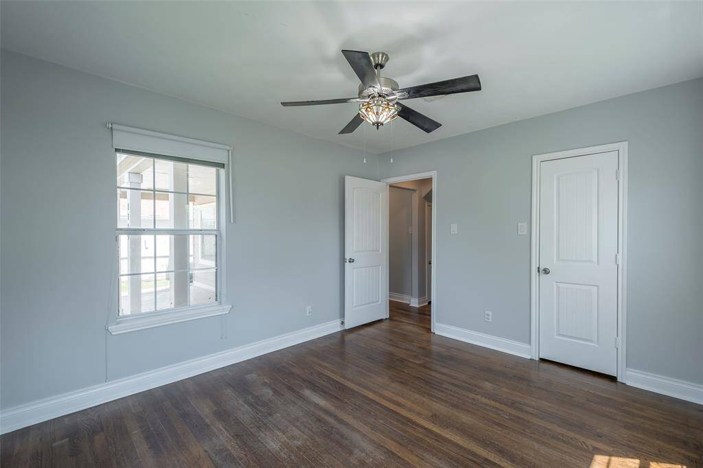 This bedroom is great for guest or a mother-in-law and includes a walk-in closet and ceiling fan.