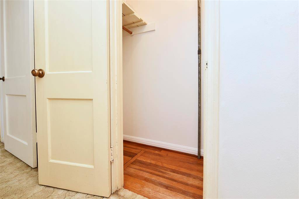 This closet is across from the bathroom and shows the original hardwoods. They are really nice.