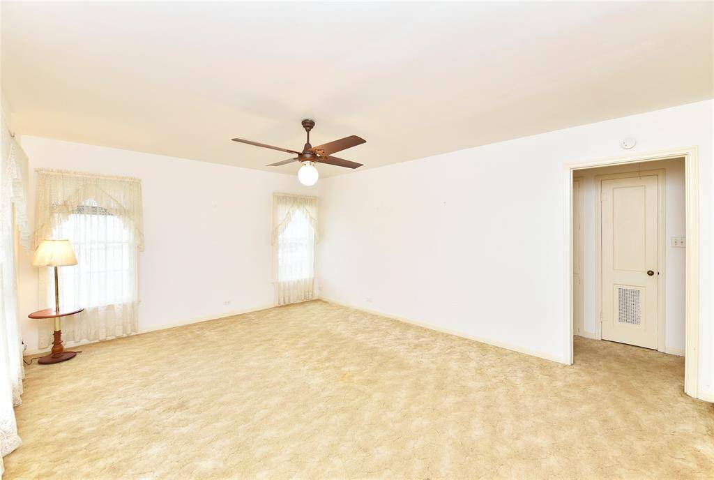 This view from the living room shows the bedroom hall.
