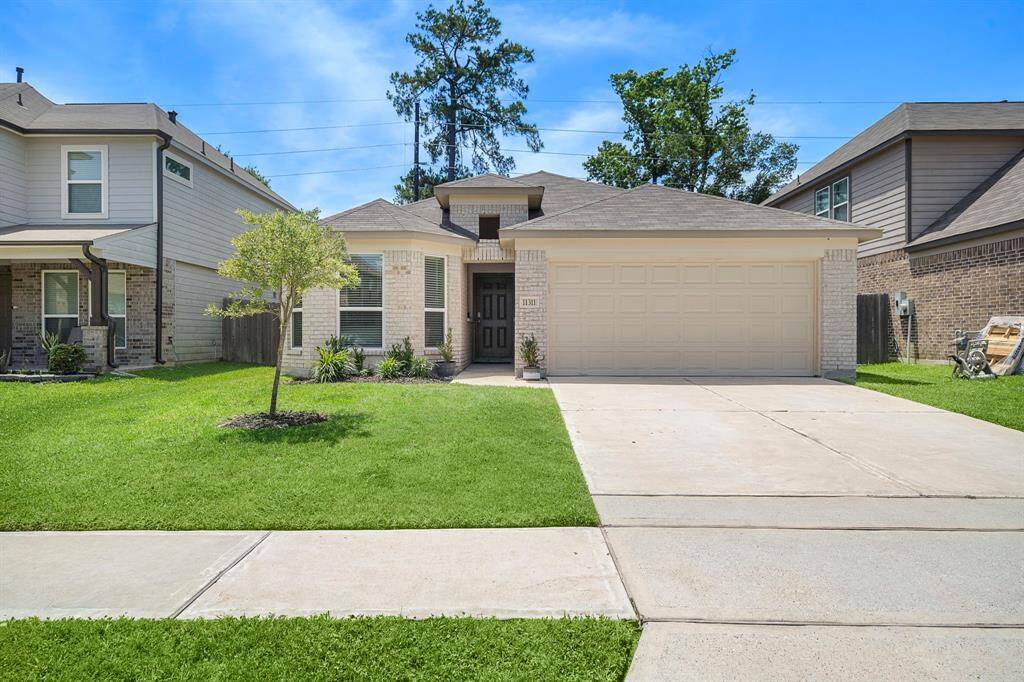 Charming single-story home with a clean, modern exterior. Features a two-car garage, neatly landscaped front yard, and a cozy entrance. Ideal for families seeking a welcoming neighborhood setting.