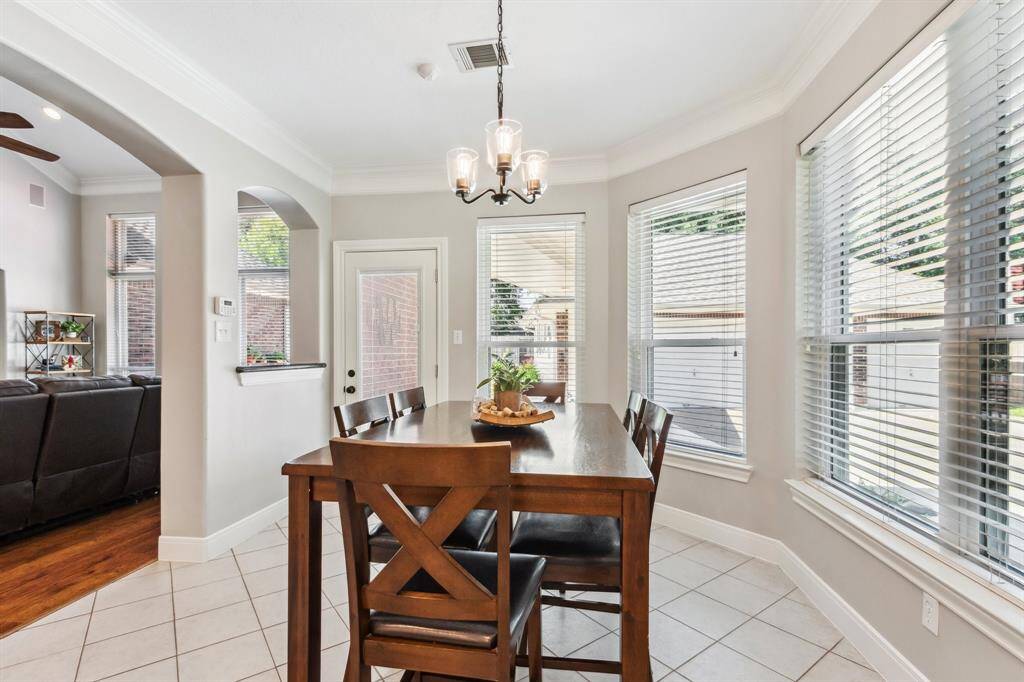Breakfast area is open to the kitchen.