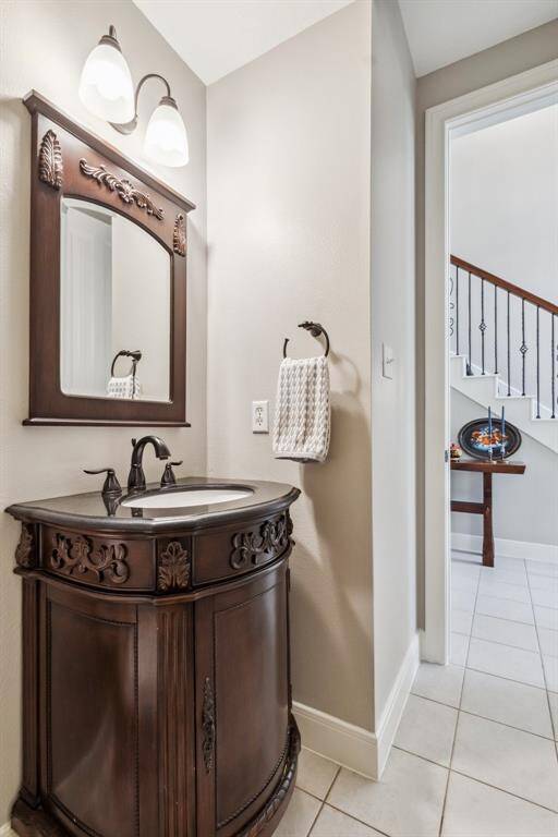 Half bath in foyer.