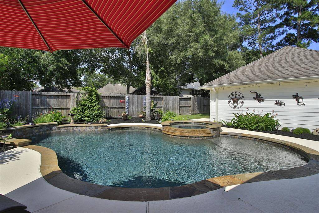 Pool features umbrella hole on large sun shelf, 2 smaller sun shelfs, holes on the sides for a volleyball net.