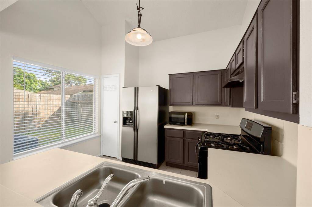 Sunny kitchen is perfect for meal preparation!