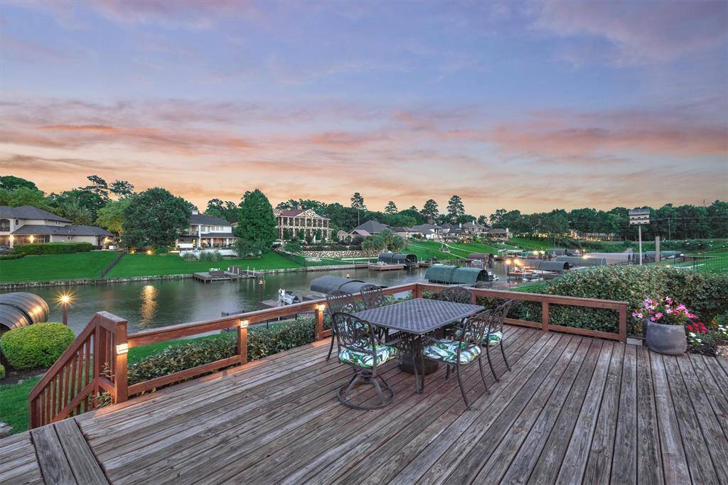 Lighted deck space enhances the ambiance and functionality of the seating areas around the pool, making it perfect for evening entertaining.