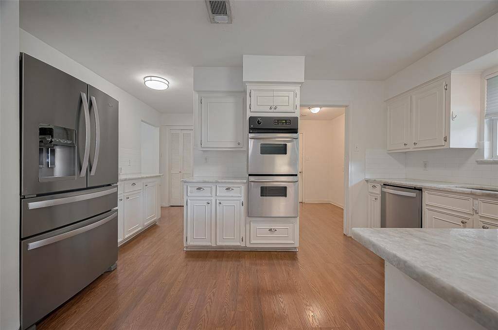 Buyer will enjoy new appliances in the kitchen.