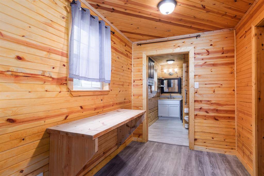 Built in desk or dressing table across from closet