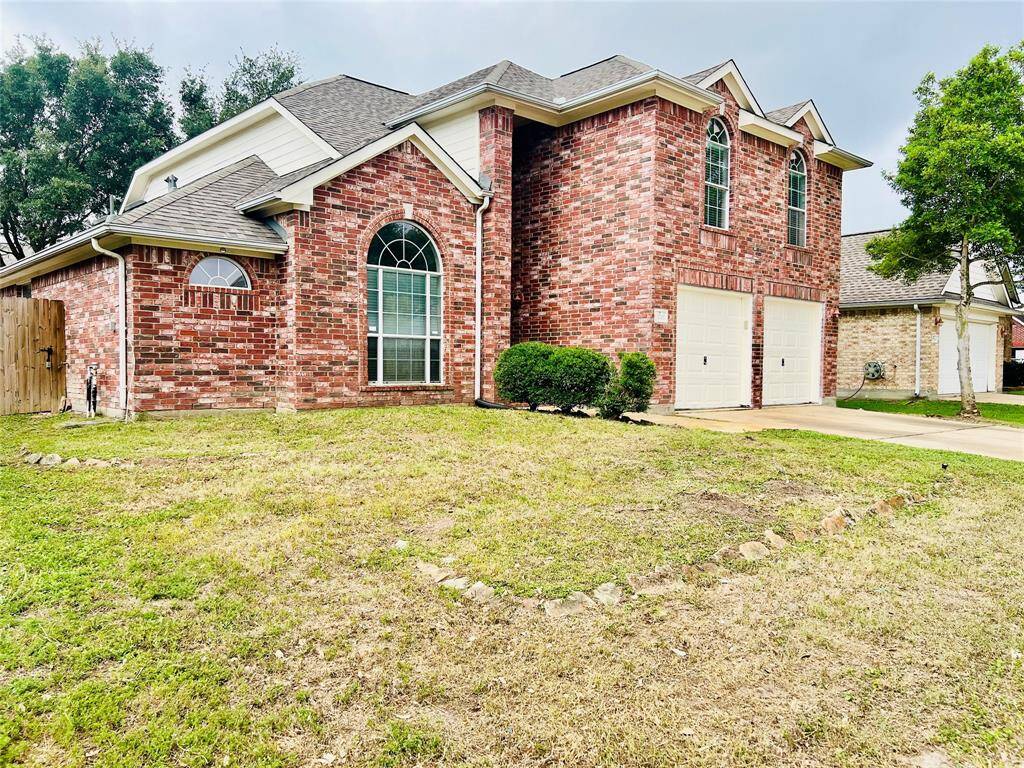This stunning 4-bedroom, 2.5-bath home radiates elegance, featuring high ceilings.