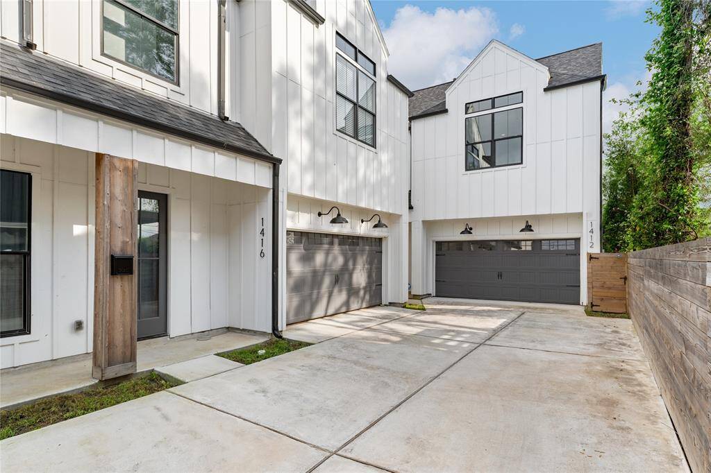 With plenty of space for multiple vehicles, this thoughtfully designed driveway ensures both convenience and functionality.
