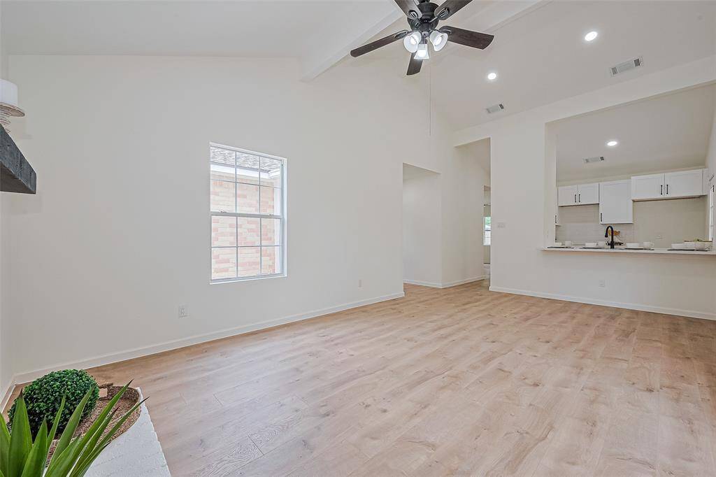 Open concept with living area and kitchen