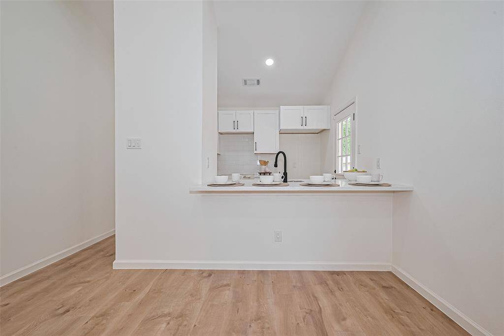 Plenty of space for bar stools or a cute breakfast table