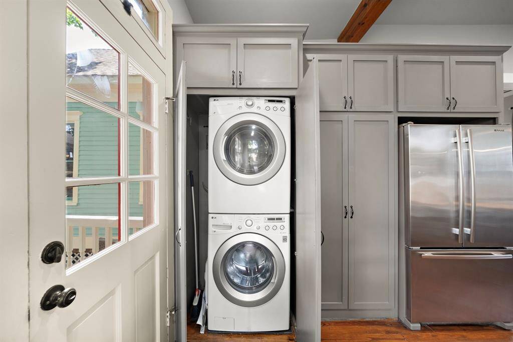 Washer / dryer located in the kitchen and tucked behind closet doors - keeping everything neat and tidy!