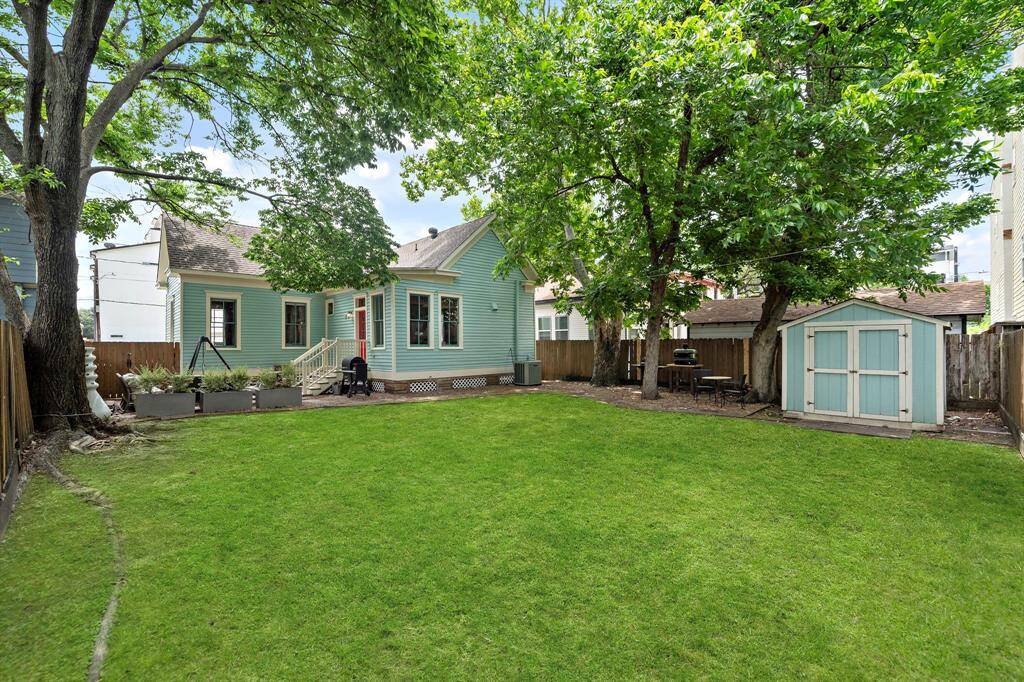 FULLY FENCED backyard - large space perfect for hosting parties, outdoor area for pets or even a pool! Or put in an addition to extend the size of the home. Garden shed for plenty of storage. NEW AC compressor + condenser (March 2024; per Seller)