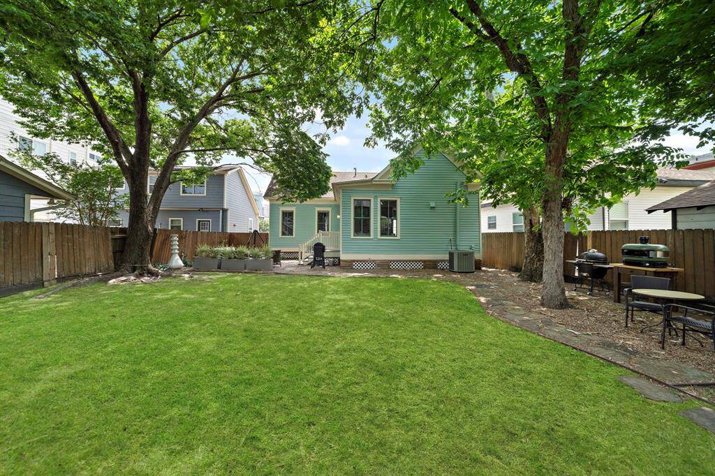 Look at those mature trees - offering a wide canopy of shade, keeping it nice and cool out here for family and friends and plenty of room for gardening and grilling!