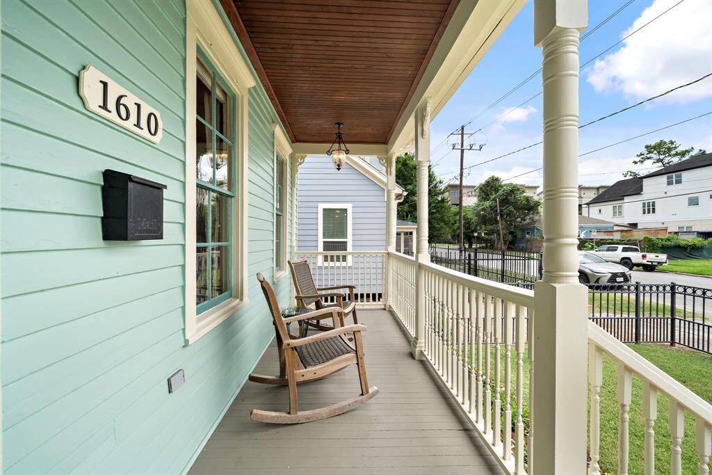 Front porch for morning coffees or evening drinks! Bead board ceiling - stained + sealed with marine quality sealant - providing years of use and enjoyment!