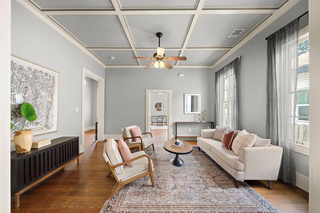 Another angle of the living room, this one looking towards the front / guest bedroom. Every room in this home is large (Buyer to verify size) and can be used in multitude of ways!
