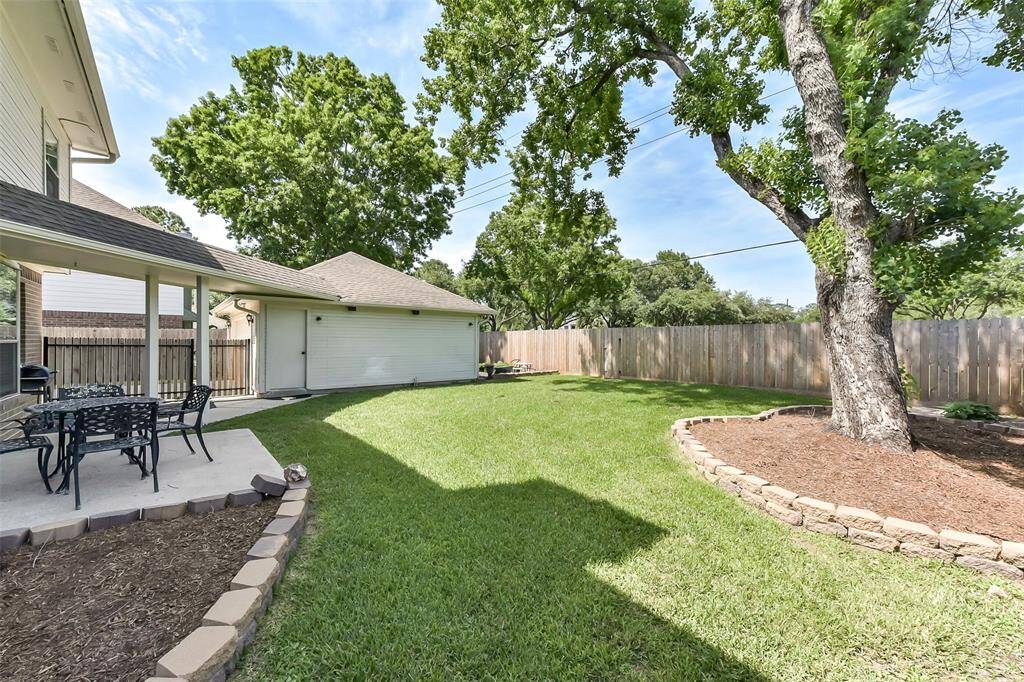 Great backyard with sprinkler system in the front and back.