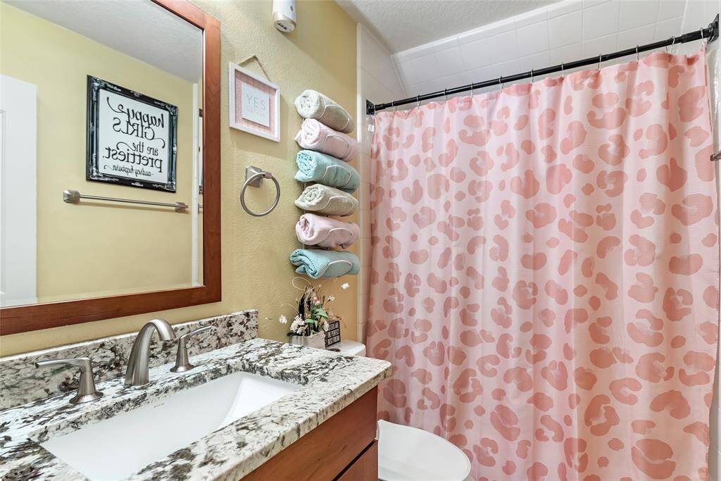 Hall bath #2 is shared between secondary bedrooms 2 and 3.