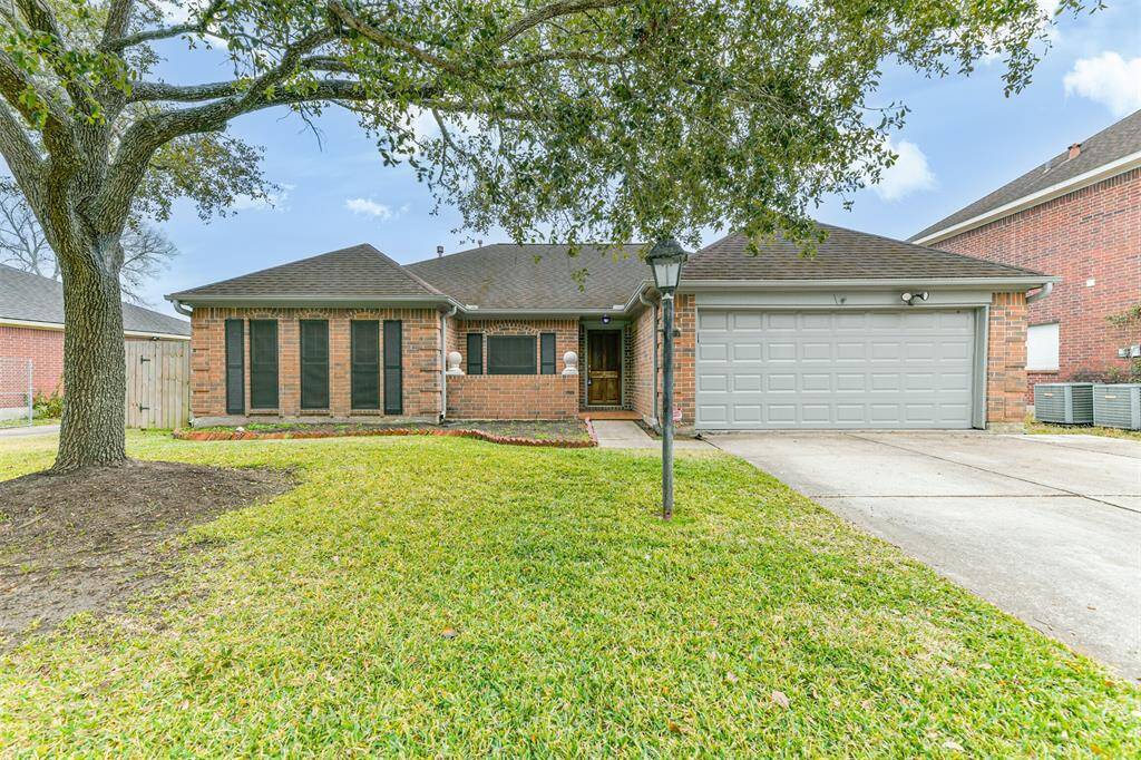 The front of this house is a canvas ready for you to dress up in the prestigious Wood creek neighborhood.